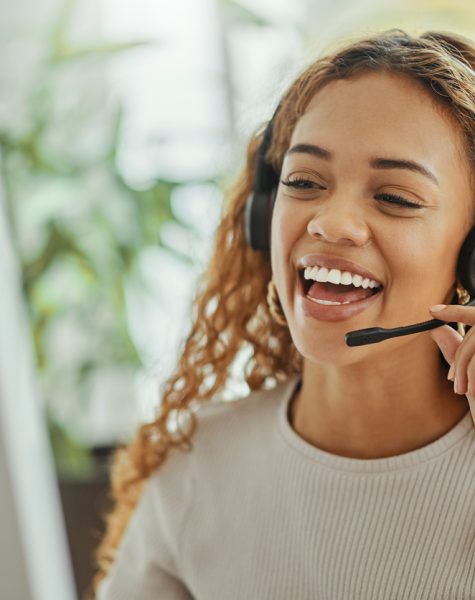 Customer service, happy and communication of woman at call center pc talking with joyful smile. Consultant, advice and help desk girl speaking with clients online with computer headset mic. Customer service, happy and communication of woman at call center pc talking with joyful smile. Consultant, advice and help desk girl speaking with clients online with computer headset mic.